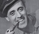 Alastair Sim as Peter Bogle in the Gusher